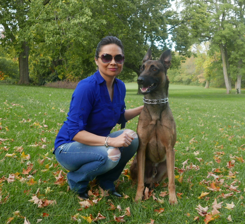 lady in jeans with family protection dog https://ultimatek9.com