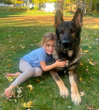 girl and family protection dog
